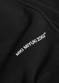 Uniform logo-print cotton-blend sweatpants