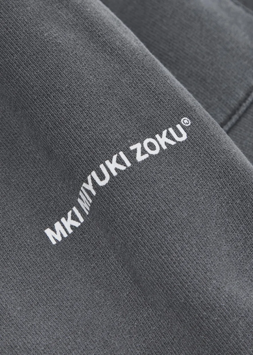 Uniform logo-print cotton-blend sweatpants