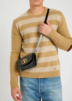 Vain small leather clutch