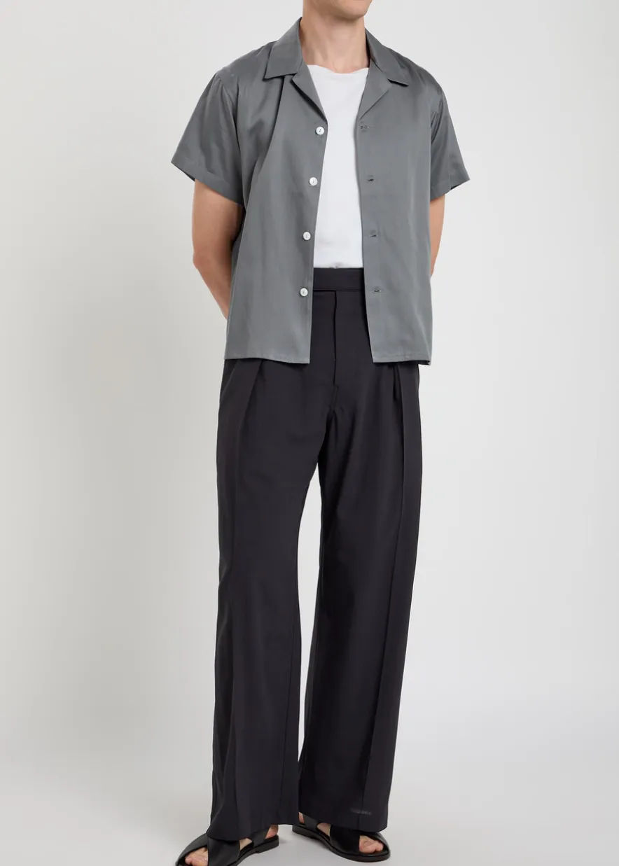 Wide-leg pleated cotton trousers