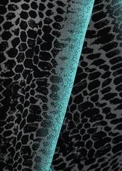 Zahra printed wide-leg knitted trousers