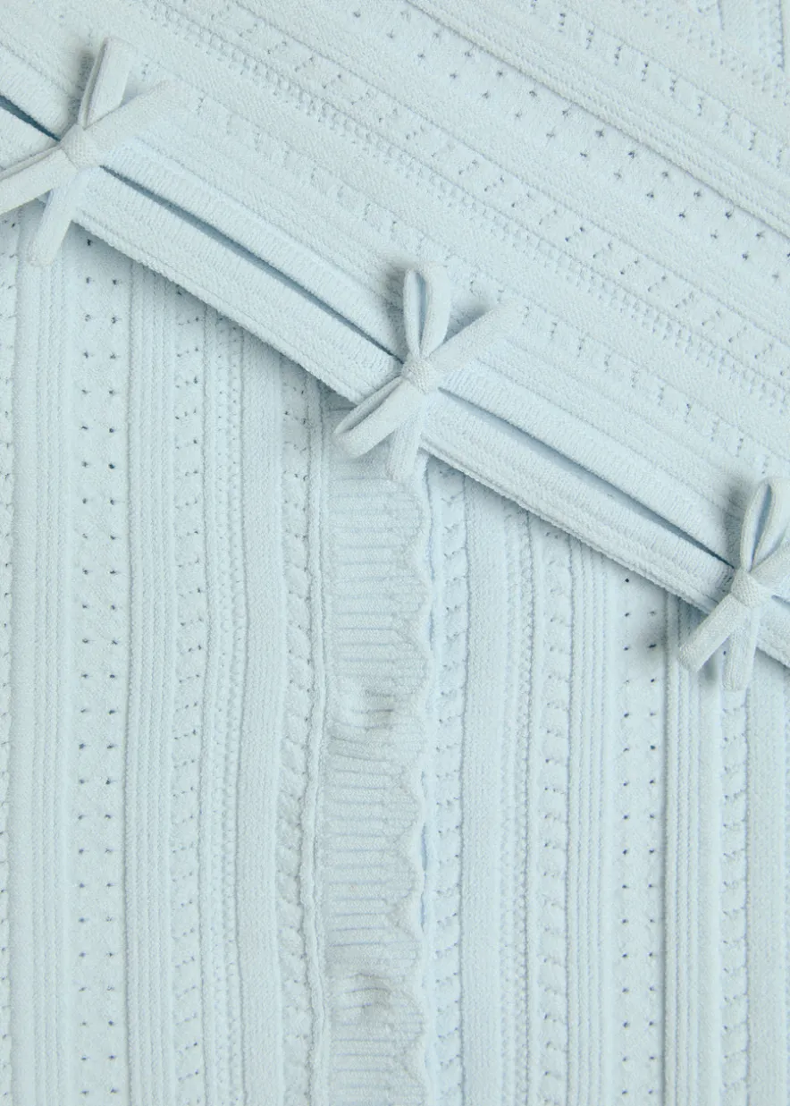 Zoriah bow-appliquéd pointelle-knit cardigan